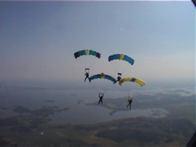 Photograph of parachuting team Team BC in formation 